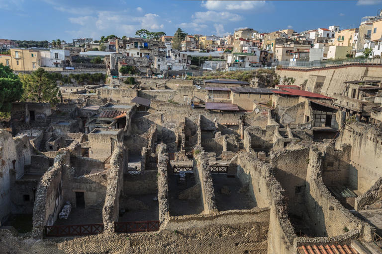 A tourist vandalised the wall of a historic villa in the town of Herculaneum.