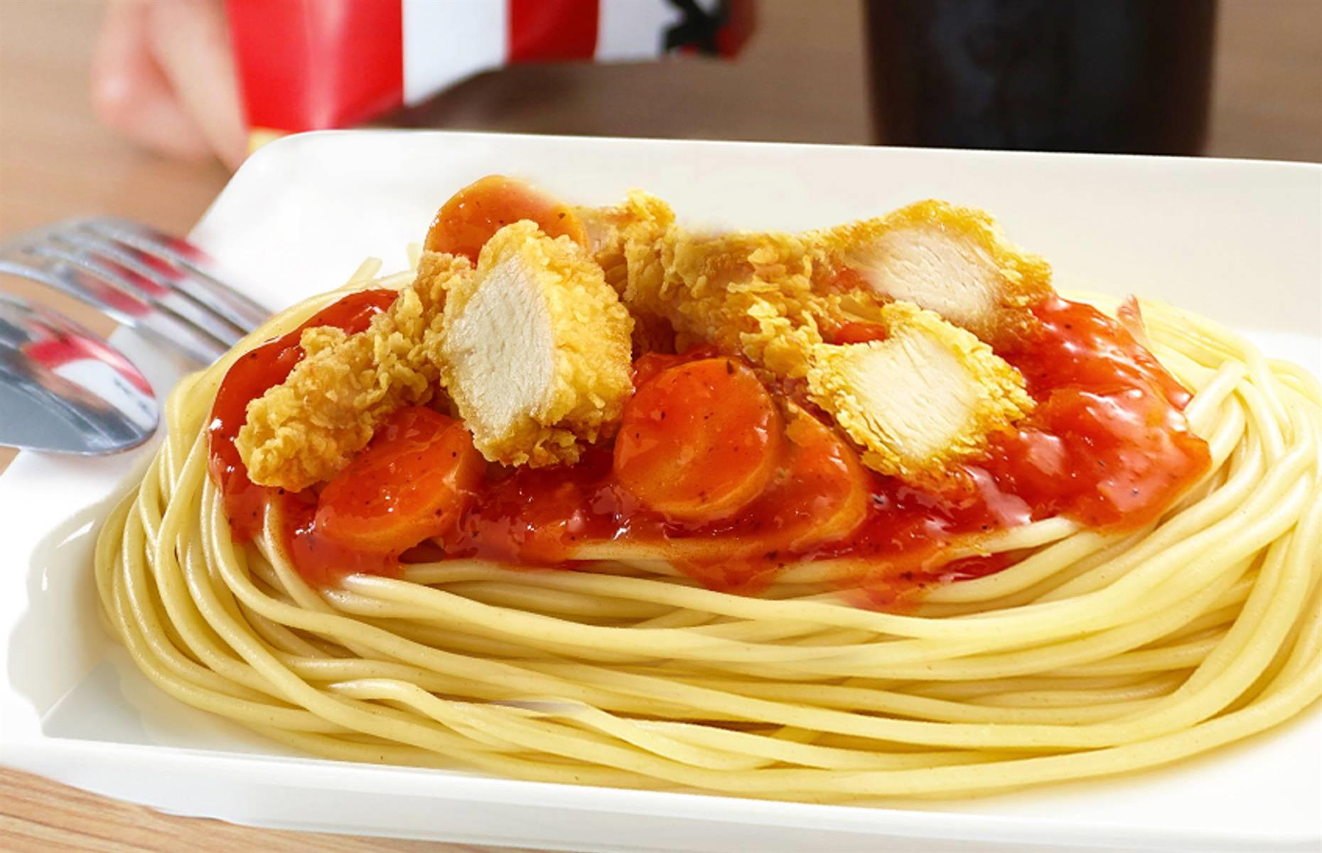 <p>In Vietnam, KFC restaurants serve spaghetti topped with tomato sauce, grated cheese and (of course) the famous fried chicken. A permanent item on the menu, you can get a portion of Pachito Pasta at any time of day, all year-round. Although its lack of authenticity may upset pasta purists, we'd happily give it a try.</p>  <p><strong>Liking this? Click on the Follow button above for more great stories from loveFOOD</strong></p>