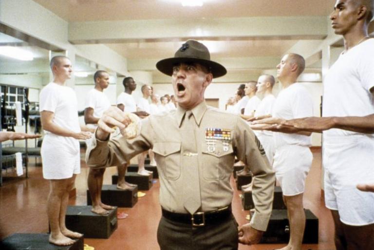 <p>In 1987, Stanley Kubrick released his film <i>Full Metal Jacket, </i>which follows a platoon of United States Marines beginning with their boot camp training and their experiences during the Tet Offensive of the Vietnam War. </p> <p>While the film is regarded as one of the greatest war films made, one aspect that makes it stand out is Lee Ermey's addition as the drill instructor, Gunnery Sergeant Hartman. Ermey was initially supposed to be a technical advisor but managed to wow Kubrick with his ability to play the drill sergeant role and the deplorable insults he could come up with on the spot. </p>