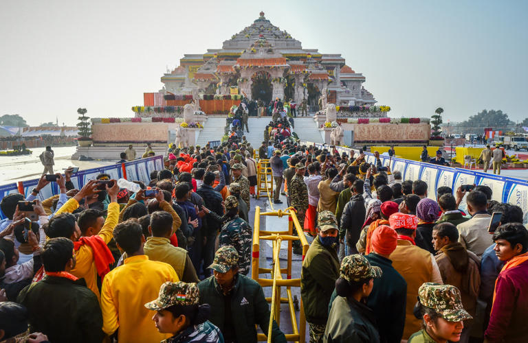 Devotees queue to get glimpse of a statue of the hindu god Ram one day after consecration ceremony of the Ram Mandir on January 23, 2024 in Ayodhya, India. Prime Minister Narendra Modi's ruling BJP suffered a surprise reverse at the site that is holy to Hindus.