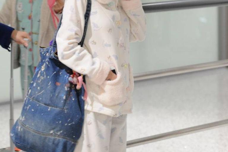 <p>Wearing your pajamas to the airport and on your flight might sound like a great idea for you, but what about the passengers? You're bound to get a handful of stares walking down the aisle wearing your PJs. </p> <p>Your best bet will be athletic attire if you want to retain some comfort. Since athleisure attire is a pretty big trend at the moment, you can't wrong sporting that style for your air travels. You might even get a few compliments on your outfit.</p>