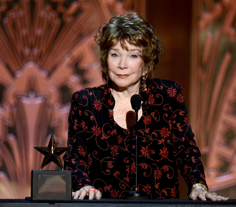 Shirley MacLaine onstage receiving her AFI Lifetime Achievement Award in 2012.