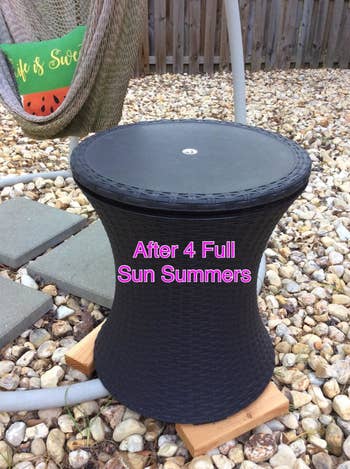 reviewer's outdoor table looking super new still with text
