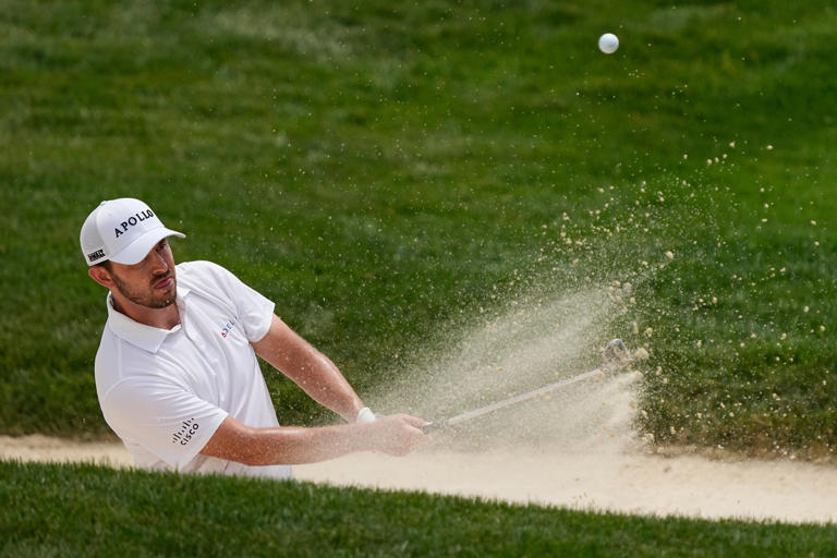 Jun 4, 2024; Columbus, Ohio, USA; Patrick Cantlay hits out of a bunker on No. 4 during a practice round for the Memorial Tournament at Muirfield Village Golf Club.