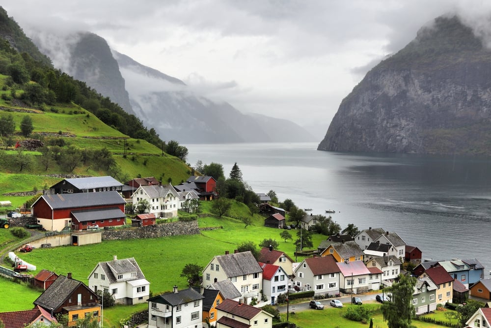 <p>If you’re looking for a picturesque town in Norway, Undredal is a must-visit destination. This idyllic town is in the Aurland municipality, located in the western part of the country.</p><p>Undredal is known for its stunning natural beauty, charming wooden houses, and famous goat cheese.</p><p>Undredal is a small town with a population of around 100 people. It is surrounded by steep mountains and fjords, making it a perfect place for hiking and exploring nature.</p><p>One of the most popular attractions in Undredal is the Undredal Stave Church. This historic church dates back to the 12th century and is one of the oldest stave churches in the country.  (Most stave churches have fallen into disrepair, and the majority still standing are in Norway!) The church is known for its intricate carvings and stunning architecture.</p>