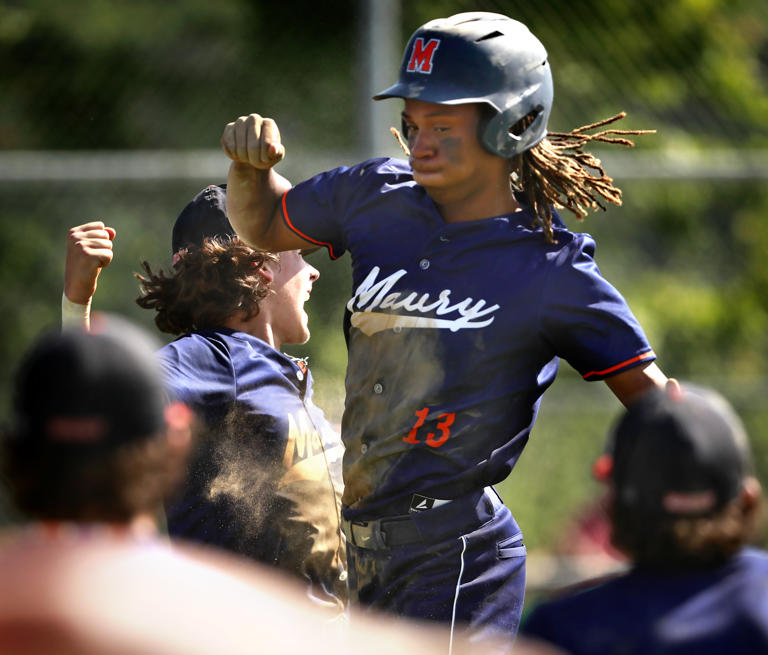 The Maury Commodores celebrate Chauncy Ragland’s run during Tuesday, June 4, 2024, afternoon’s Class 5 state baseball quarterfinals against Ocean Lakes.