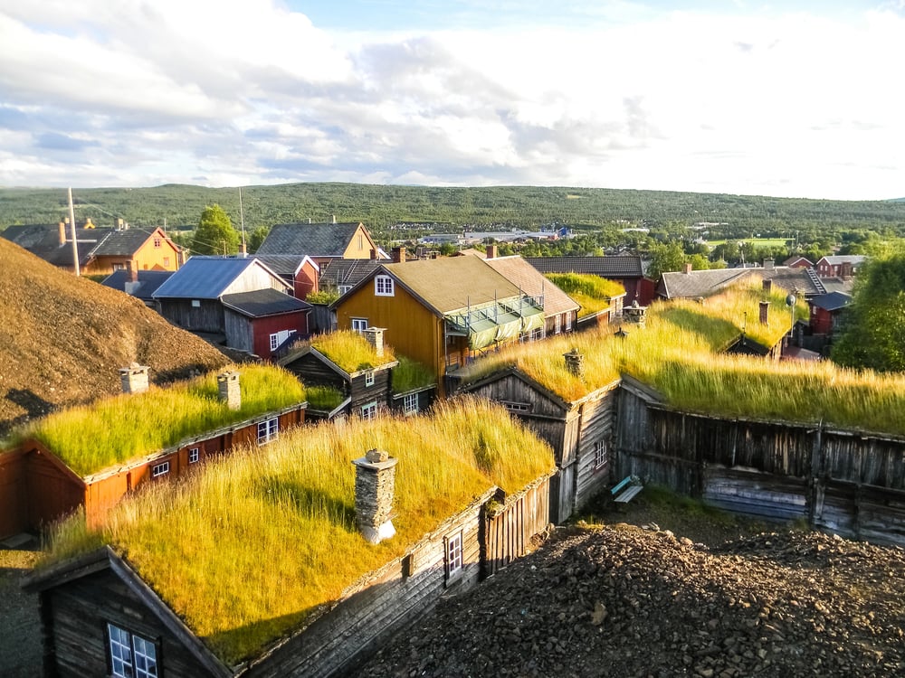 <p>If you are looking for a picturesque town in Norway, Roros should definitely be on your list. Located in the Trondelag region, this charming town is known for its well-preserved wooden buildings.</p><p>One of Roros’s most striking features is its unique architecture. The town is home to over 80 wooden buildings dating back to the 17th and 18th centuries. These buildings have been carefully preserved and restored, many have traditional sod roofs, and almost all are timber built.</p><p>In addition to its architecture, Roros is also known for its mining history. The town was once a major copper mining center, and the remnants of this industry can still be seen throughout the town.</p>