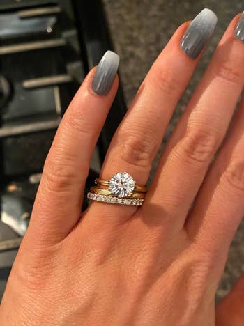 reviewer's diamond ring sparkling on their hand
