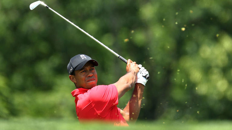 DUBLIN, Ohio - Tiger Woods makes a swing during the Final Round of the 2012 Memorial Tournament at Muirfield Village Golf Club.