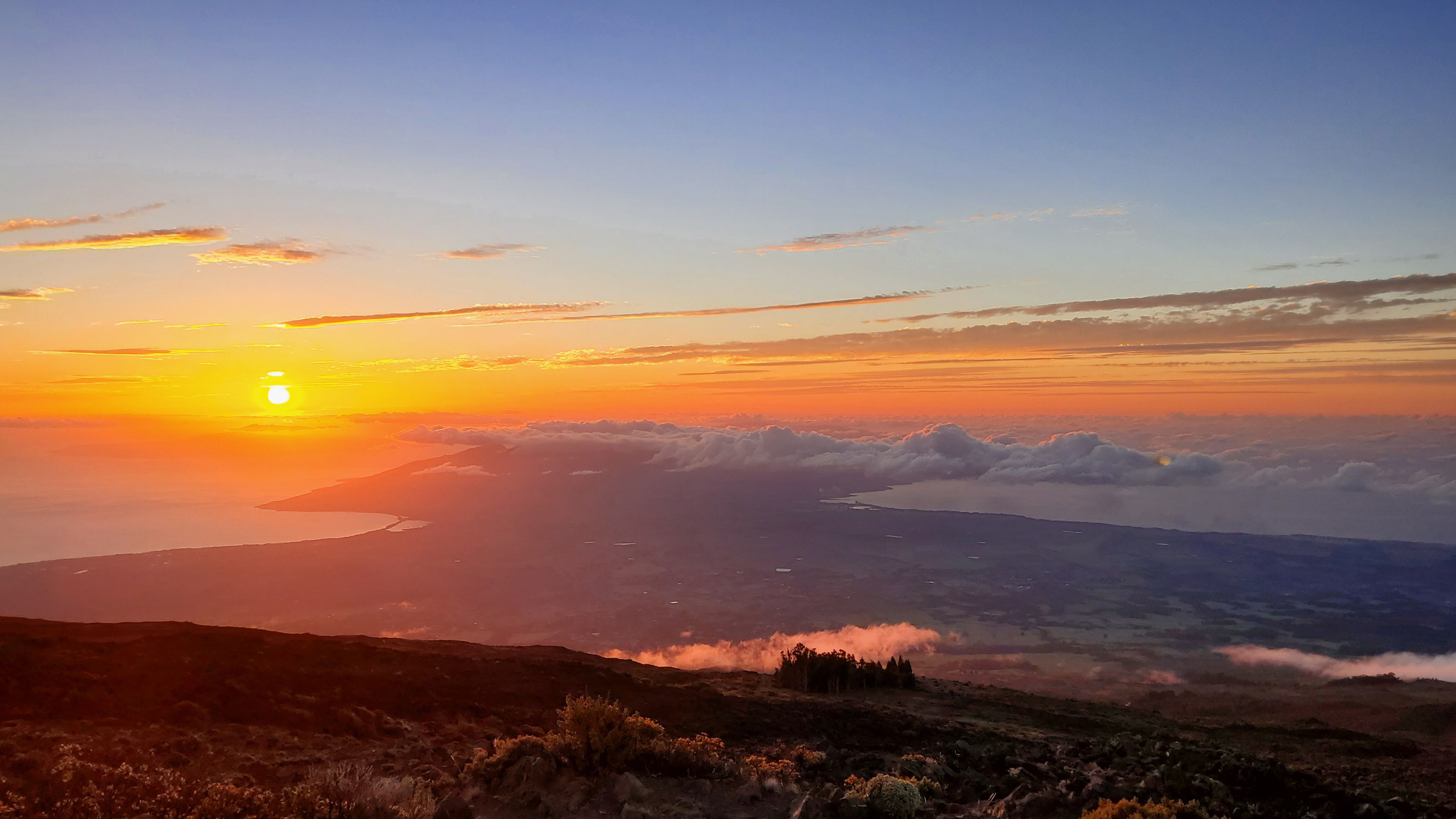 <p><b>Average Star Review: </b>4.812</p><p>Stand above the clouds and watch the sun set on top of a dormant volcano. Haleakala National Park offers a sunset experience like no other. The high altitude provides a surreal view, making you feel like you’re on another planet. <a href="https://www.nps.gov/hale/planyourvisit/sunset.htm">Plan ahead</a> and head to the summit of Haleakala for an unforgettable experience.</p>