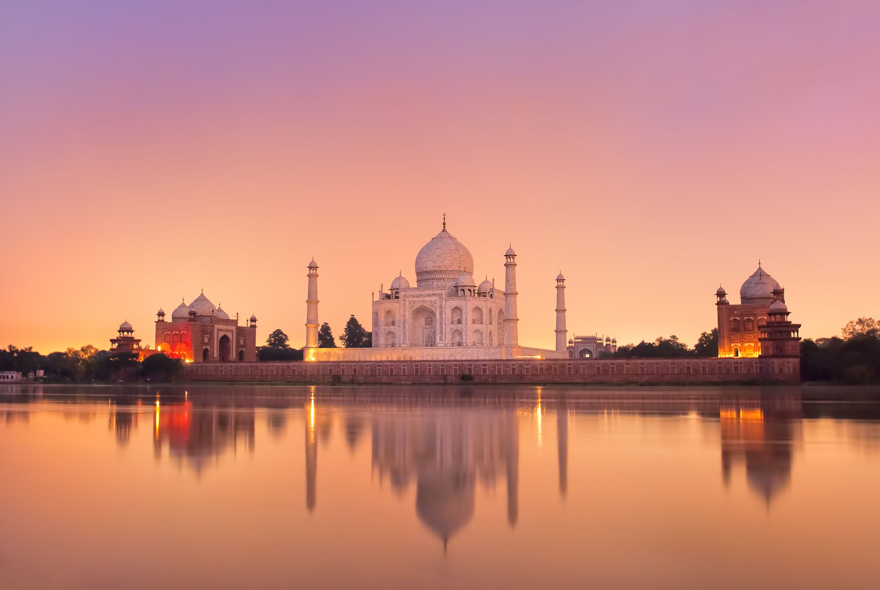 <p><b>Average Star Review</b>: 4.864</p><p>The Taj Mahal in India is stunning at sunrise, but if you're a sunset person, the experience is equally magical. As the sun sets, the white marble of the Taj glows with warm, golden hues. The lush gardens and reflecting pools add to the breathtaking view.</p>