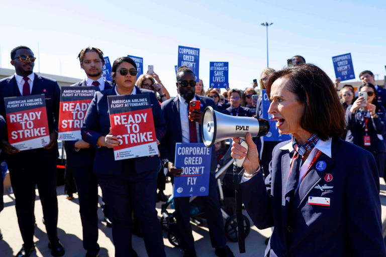 Julie Hedrick, president of the Association of Professional Flight Attendants leads a picket demanding better pay and working conditions in contract negotiations, Tuesday, Feb. 13, 2024 at Dallas Fort Worth International Airport.