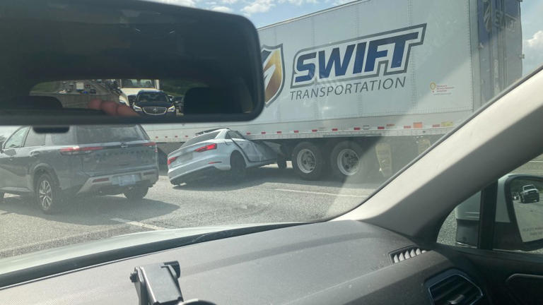 Car stuck under semi-truck on I-85 in Spartanburg Co.