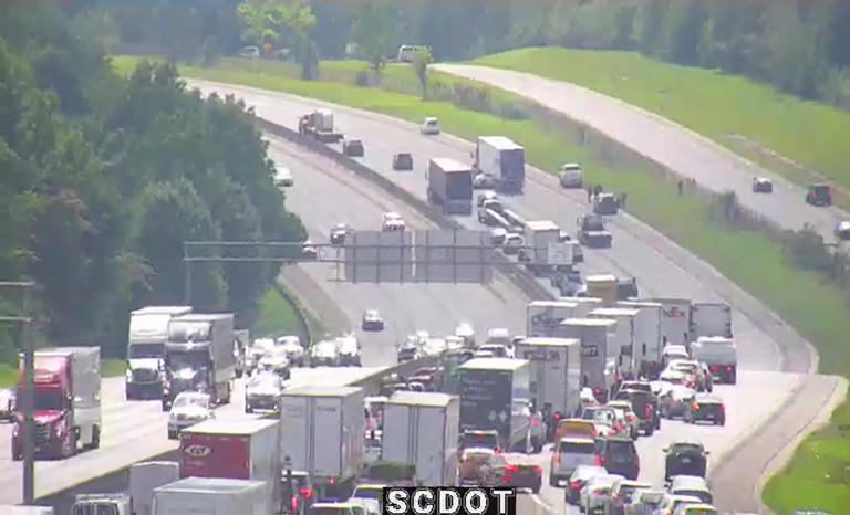 Car stuck under semi-truck on I-85 in Spartanburg Co.