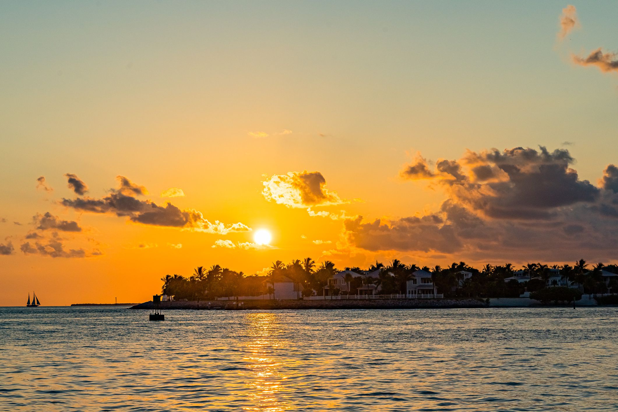 <p><b> Average Star Review:</b> 4.487</p><p>Mallory Square in Key West is the ultimate sunset celebration spot. Every evening, crowds gather for the <a href="https://www.trolleytours.com/key-west/mallory-square-sunset#:~:text=Mallory%20Square%20Sunset%20Celebration&text=Located%20at%20the%20center%20of,the%20world%20famous%20sunset%20celebration.">famous Sunset Celebration</a>, featuring street performers, local artisans, and food vendors. As the sun sets over the Gulf of Mexico, the sky lights up in brilliant hues, creating a festive and vibrant atmosphere.</p>