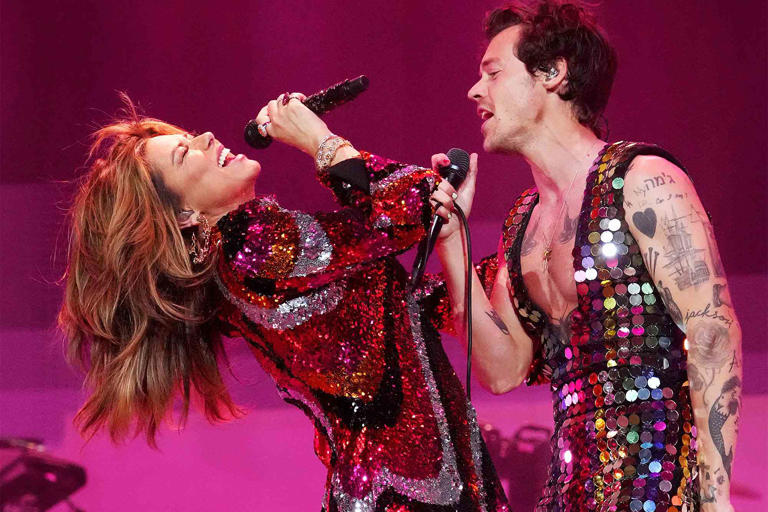 Kevin Mazur/Getty Shania Twain (left) and Harry Styles perform together at Coachella in 2022
