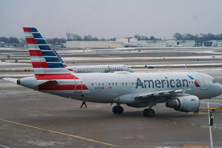 The NAACP said it might reinstate a travel advisory against American Airlines because of alleged discrimination faced by Black passengers and cited in an ongoing lawsuit