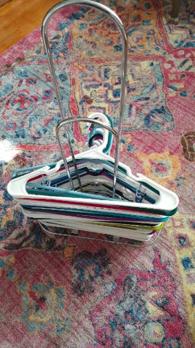 Same reviewer's picture of the hangers now neatly piled on the stacker