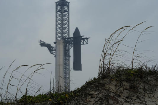 SpaceX's mega rocket Starship is prepared for a test flight from Starbase in Boca Chica, Texas, Wednesday, June 5, 2024. The Starship is scheduled to launch Thursday. (AP Photo/Eric Gay)
