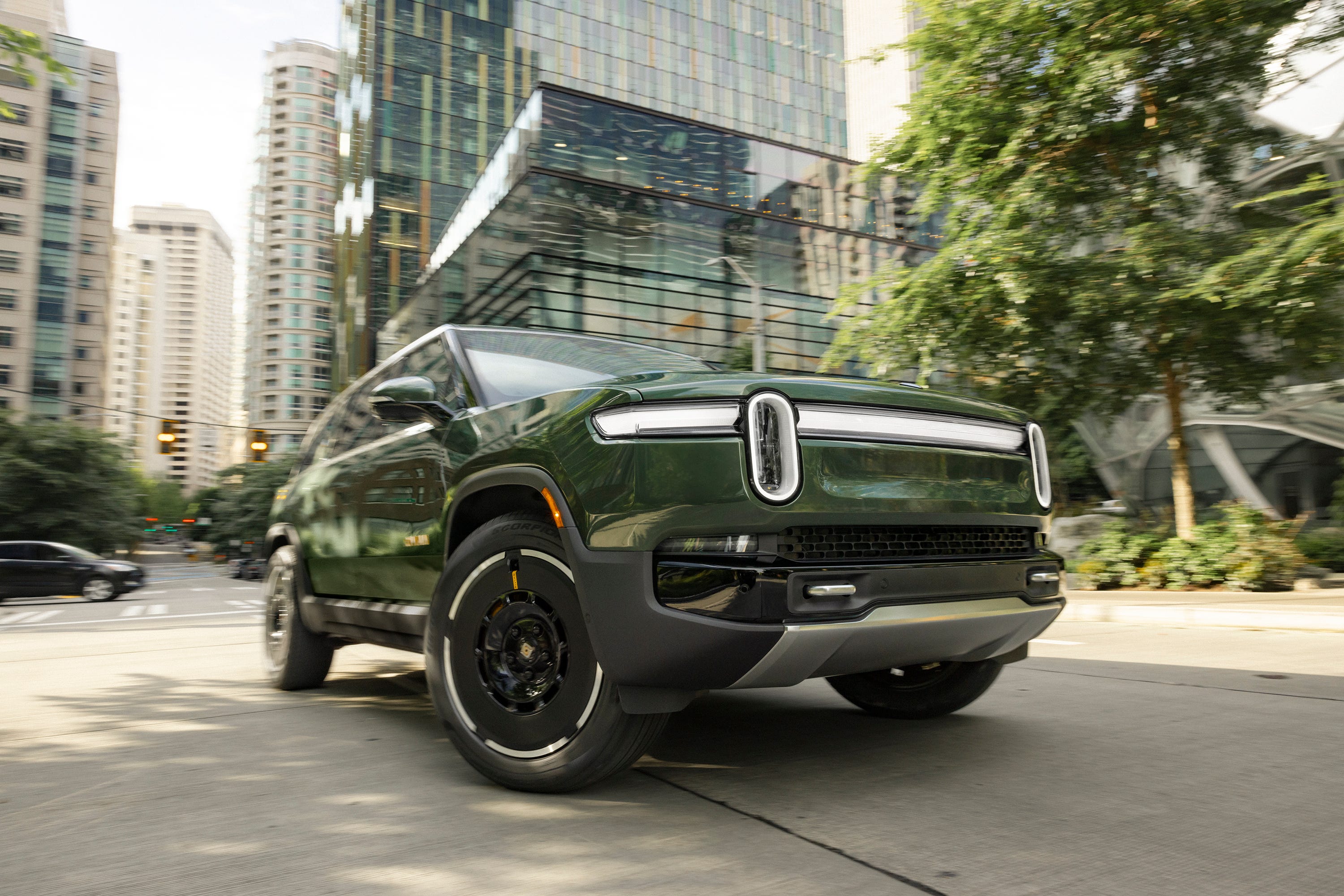 Rivian says its updated electric pickup and SUV are faster and have ...