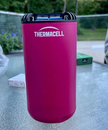 reviewer photo of the repellent in pink