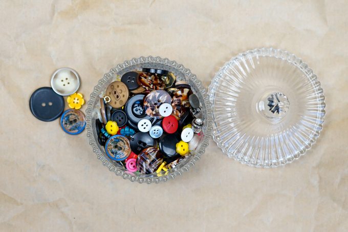 Glass Jar Storing Colourful Buttons