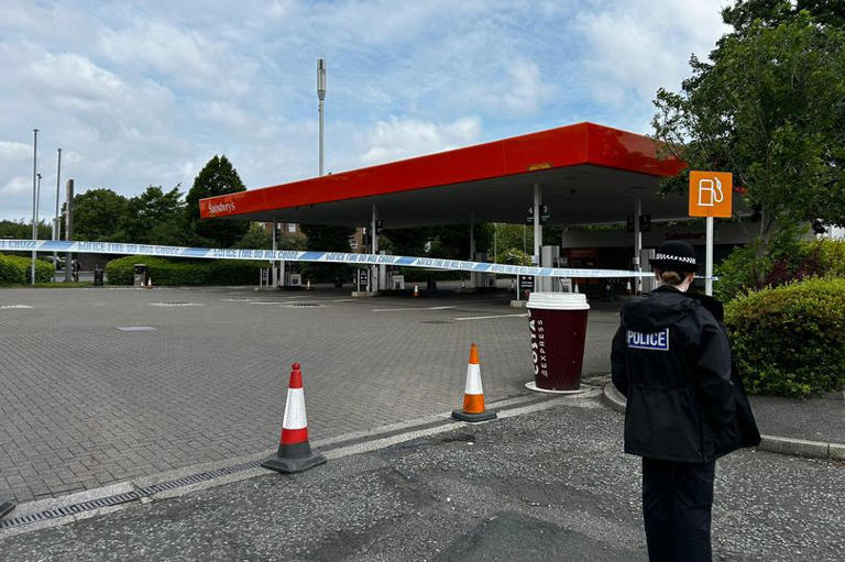 Police surround Sainsbury's petrol station