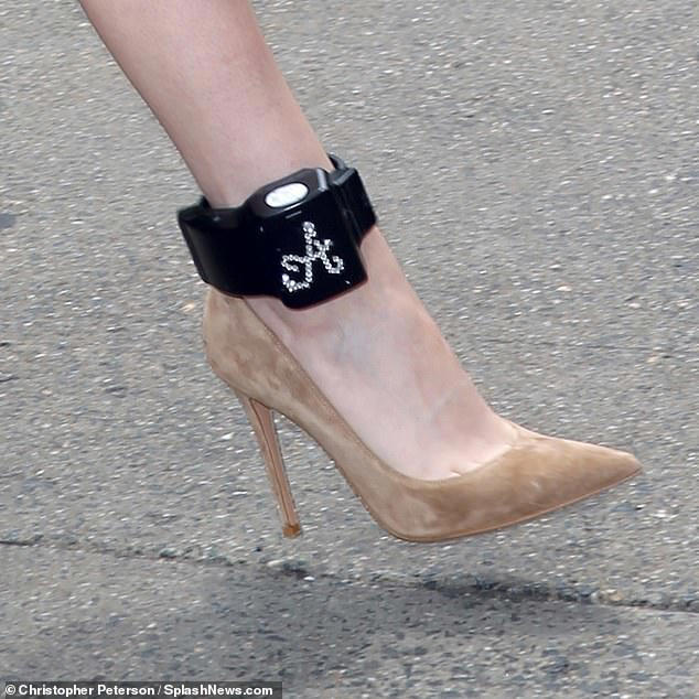 Anna Delvey Debuts Latest Look A Monogrammed Bedazzled Ankle Monitor