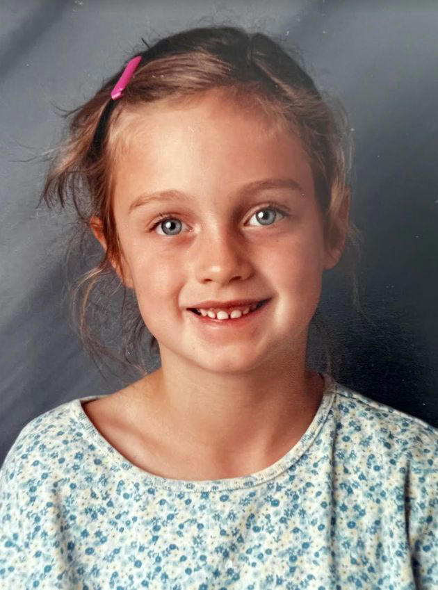 Nina's first grade school photo in 1998.