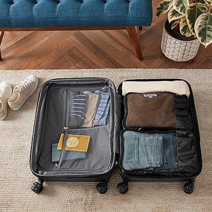 <p><em>Image via Amazon.</em></p><p>They may do it with a smile, but flight attendants aren't fans of wrestling with overstuffed overhead bins. Invest in a carry-on-sized suitcase that meets airline regulations and utilize <a href="https://amzn.to/45fEzkJ">packing cubes</a> to maximize space and stay organized. Consider doing laundry mid-trip on longer journeys to avoid overpacking.</p>