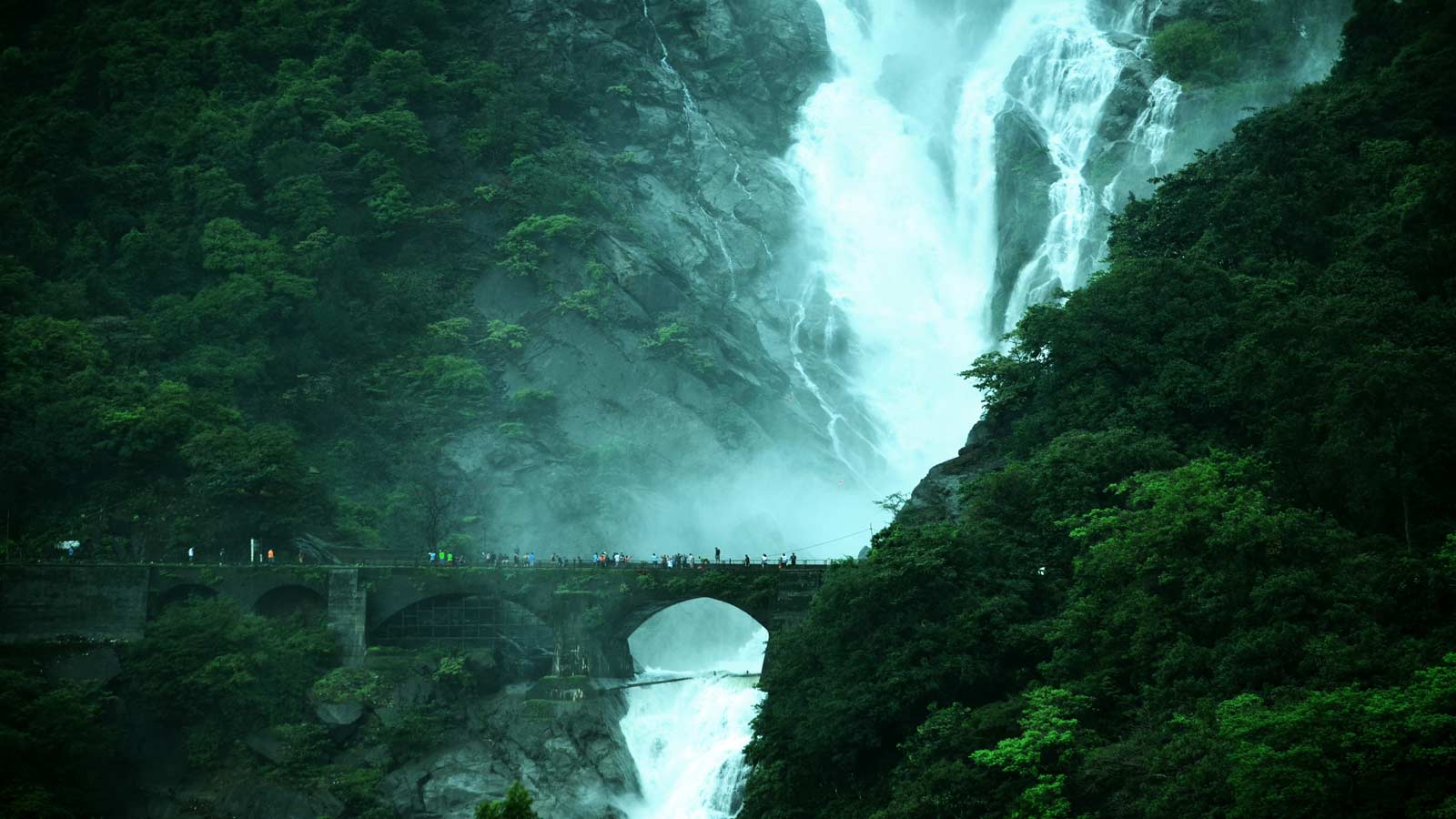 <p><span>Dudhsagar Falls, one of India’s tallest and most impressive waterfalls, cascades over 1,000 feet in four tiers and spans nearly 100 feet in width. The water’s speed and force create a “sea of milk” illusion as it plunges into the Mandovi River. </span></p><p><span>Located in Goa’s Bhagwan Mahaveer Sanctuary, the falls are about 37 miles from Panjim and 28 miles from Margao.</span></p>