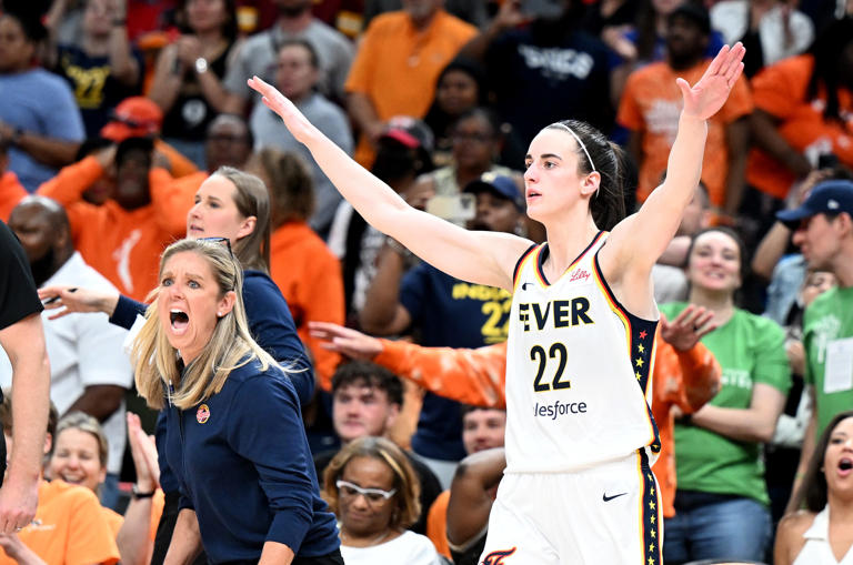 WASHINGTON, DC - JUNE 07: Head coach Christie Sides and Caitlin Clark #22 of the Indiana Fever celebrate after a 85-83 victory against the Washington Mystics at Capital One Arena on June 07, 2024 in Washington, DC.