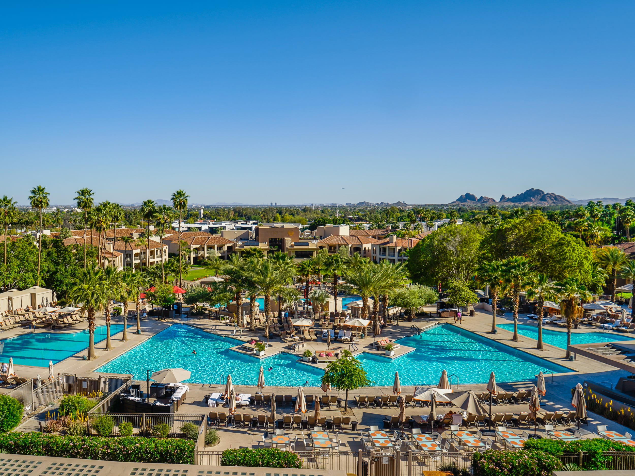 <p>My stay at the Phoenician screamed luxury from the start. </p><p>As my cab entered the 600-acre property's winding road, I spotted giant fountains, sculptures, and an 18-hole golf course. I had to confirm my reservation with a security guard before we got to the main building, which made the resort feel exclusive.</p><p>In addition to the 645 rooms, the <a rel="" href="https://www.businessinsider.com/photos-evermore-orlando-luxury-beach-resort-big-groups-2024-3">mega-resort</a> had every amenity to make tourists feel like VIPs, from a five-star spa to luxury car rentals.</p><p>The <a rel="" href="https://markets.businessinsider.com/news/stocks/marriott-international-expects-to-introduce-more-than-35-luxury-hotels-around-the-world-in-2023-1031957992">luxury Marriott Hotel</a> also had five pools — one for adults only — and an athletic club with tennis, pickleball, and basketball courts.</p><p>There were so many high-end activities and experiences that I thought affluent tourists could spend an entire vacation just at the resort and have a lavish time.</p>