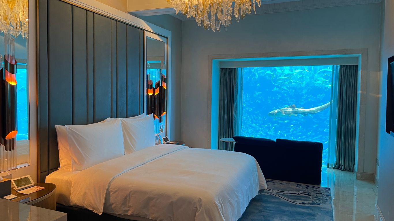 Floor-to-ceiling windows in the two iconic Underwater Suites look onto the Ambassador Lagoon, so guests can watch sharks, rays and fish swim by from the king-sized bed and marble bathtub. Each three-level suite has its own elevator, a lounge overlooking the lagoon and 24-hour butler service.