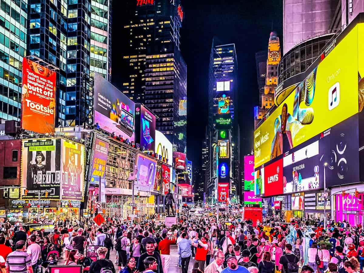 <p>Times Square is in the heart of New York City. It welcomes so many tourists each day that the city made portions of the area off limits to cars beginning in 2009.</p>