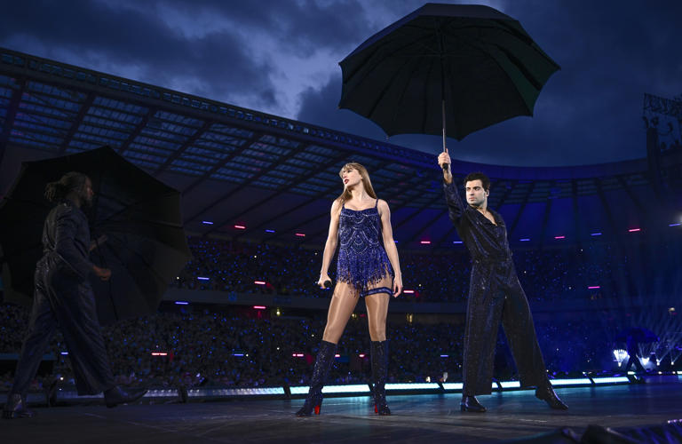 Taylor Swift (front) and dancer Jan Ravnik perform on June 07, 2024 in Edinburgh, Scotland. Her fans have fallen for Ravnik's dance moves.