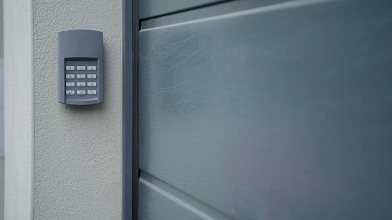 keypad installed near garage door