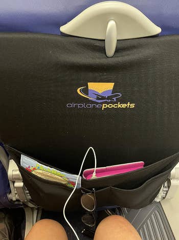 Reviewer image of tray with a pocket on it holding all their stuff