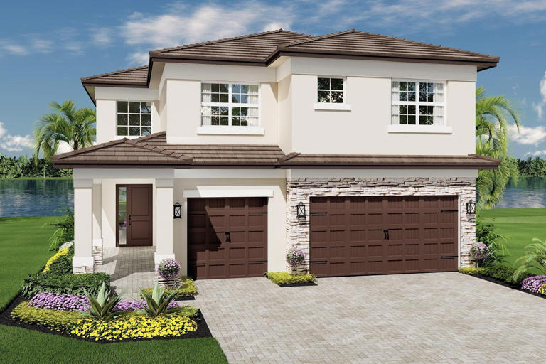 Monterey home by GL Homes in Arden, Florida - two-story modern design with a three-car garage, light stucco walls, and stone accents. Ideal for families seeking luxury living with state-of-the-art amenities and a vibrant community lifestyle.