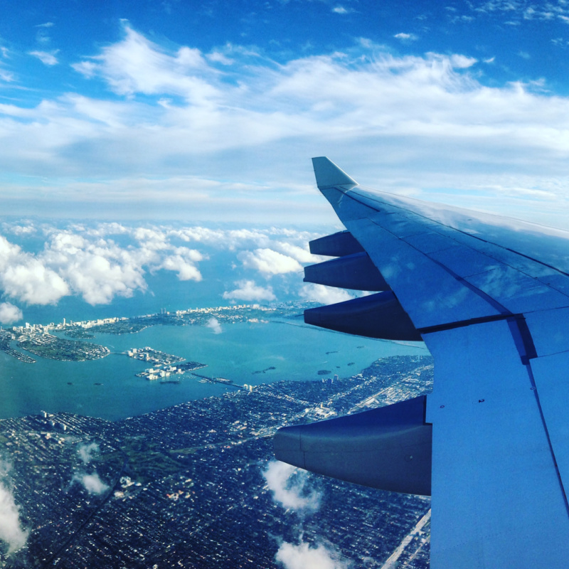 Plane flying over Miami