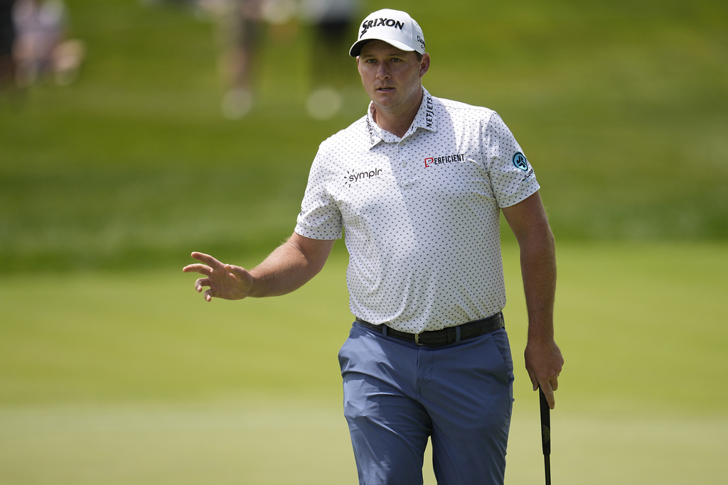 <p>Sepp Straka waves after his putt on the first green in the third round of the Memorial golf tournament, Saturday, June 8, 2024, in Dublin, Ohio. </p>