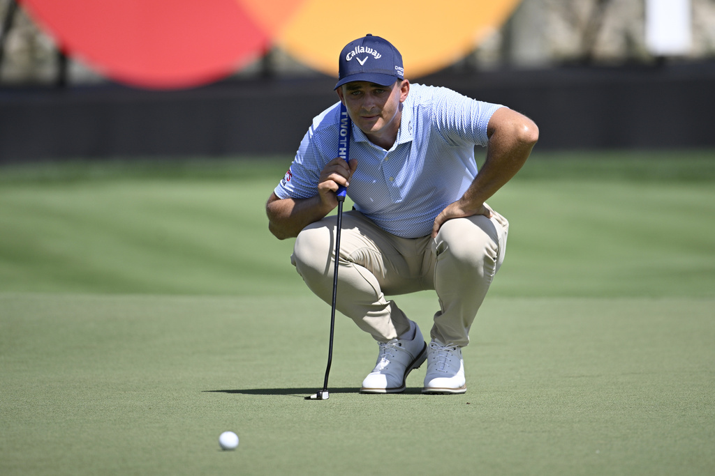 <p>Christiaan Bezuidenhout, of South Africa, lines up his putt on the 14th green after making his putt during the first round of the Arnold Palmer Invitational golf tournament, Thursday, March 7, 2024, in Orlando, Fla. </p>