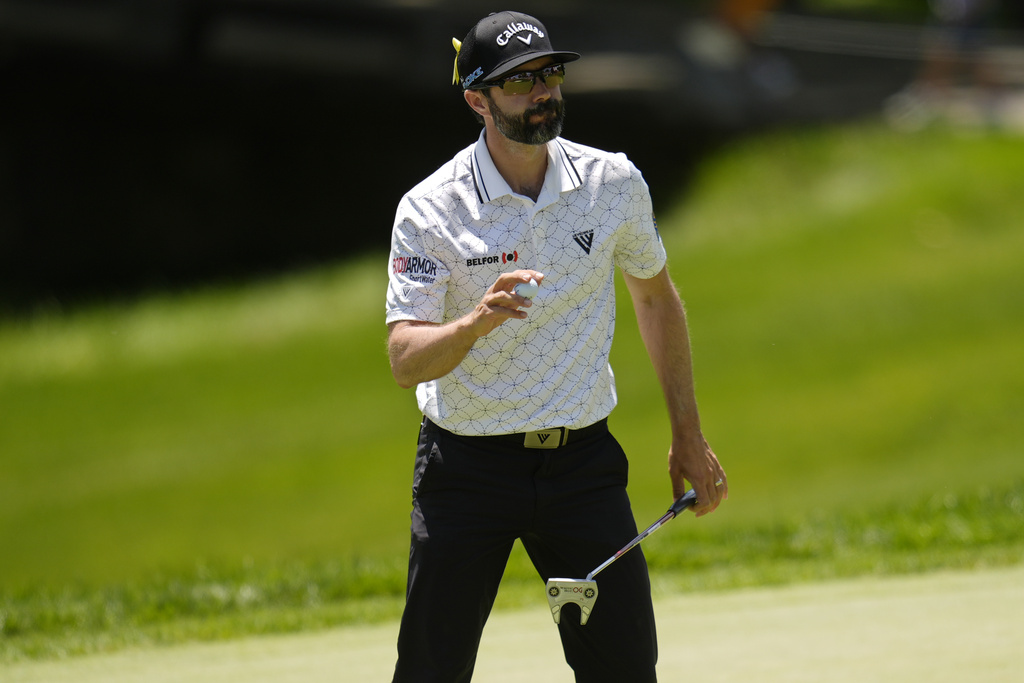 <p>Adam Hadwin waves after putting on the fourth green during the final round of the Memorial golf tournament, Sunday, June 9, 2024, in Dublin, Ohio. </p>