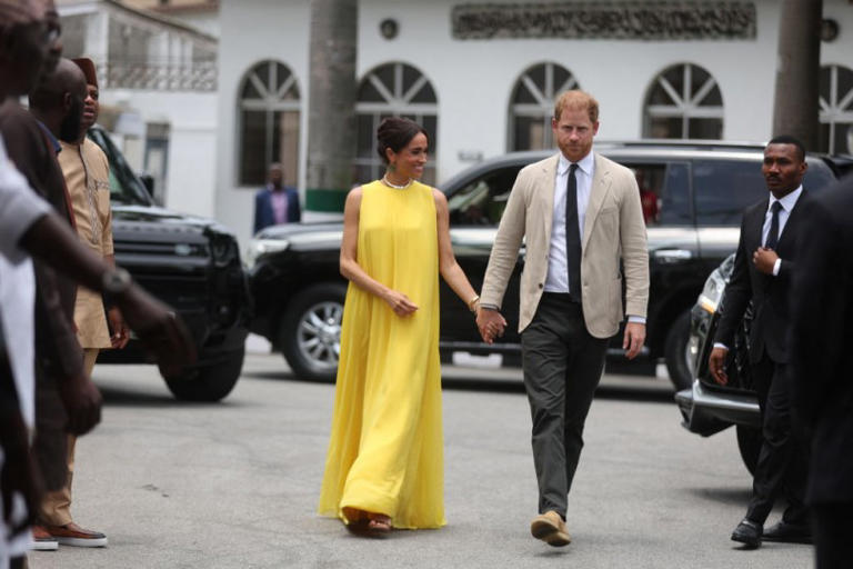 Britain's Meghan (L), Duchess of Sussex, and Britain's Prince Harry (R), Duke of Sussex arrive at the State Governor House in Lagos on May 12, 2024 as they visit Nigeria as part of celebrations of Invictus Games anniversary. (Photo : KOLA SULAIMON/AFP via Getty Images)