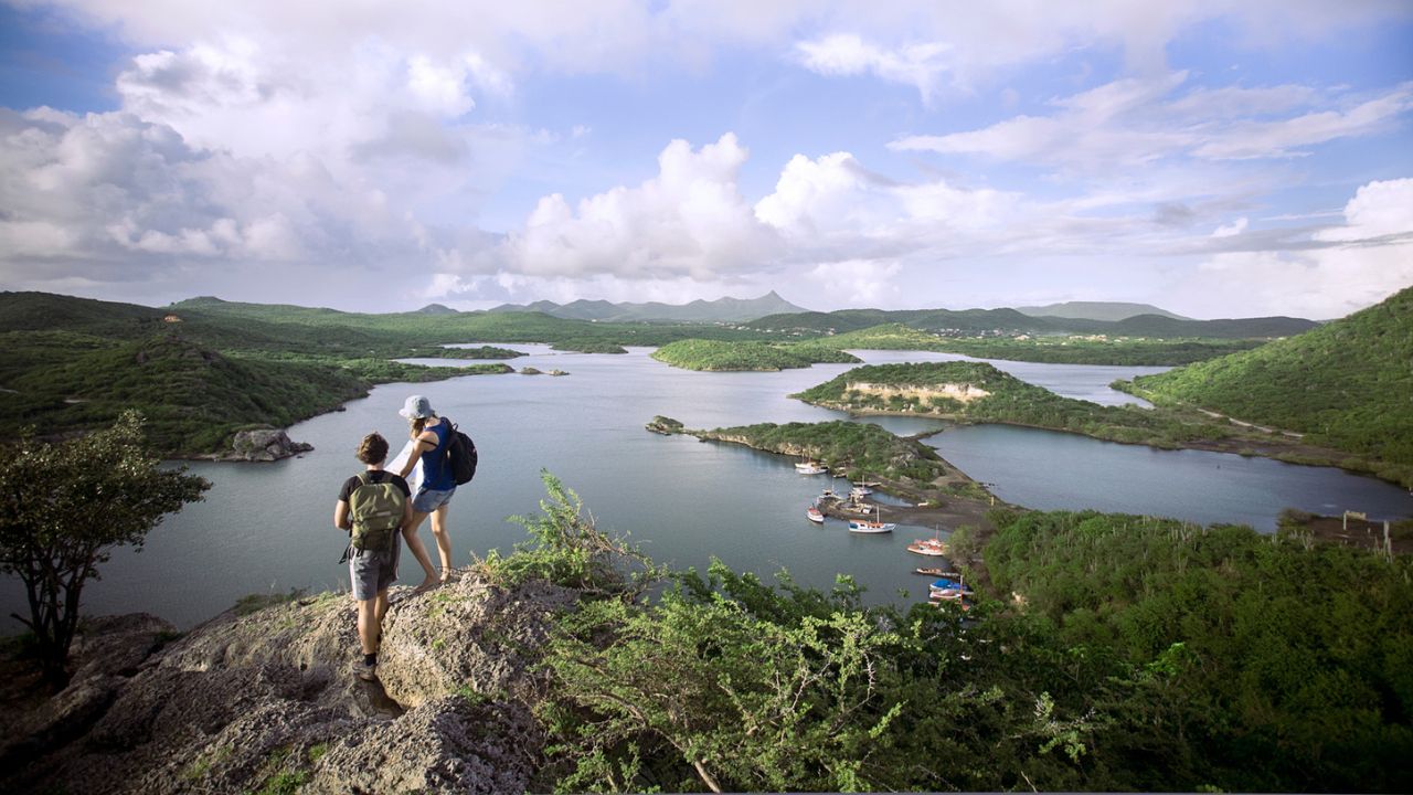 <p>Just beyond the beautiful beaches of Curaçao’s rugged western end lies treasures like the Santa Martha Lookout, offering breathtaking views of the nearby bay and hillsides. The scenery is remarkable whether you visit during the drier season or amidst lush greenery, and is a quick stop en route to must-see island beaches like Playa Lagun.</p>