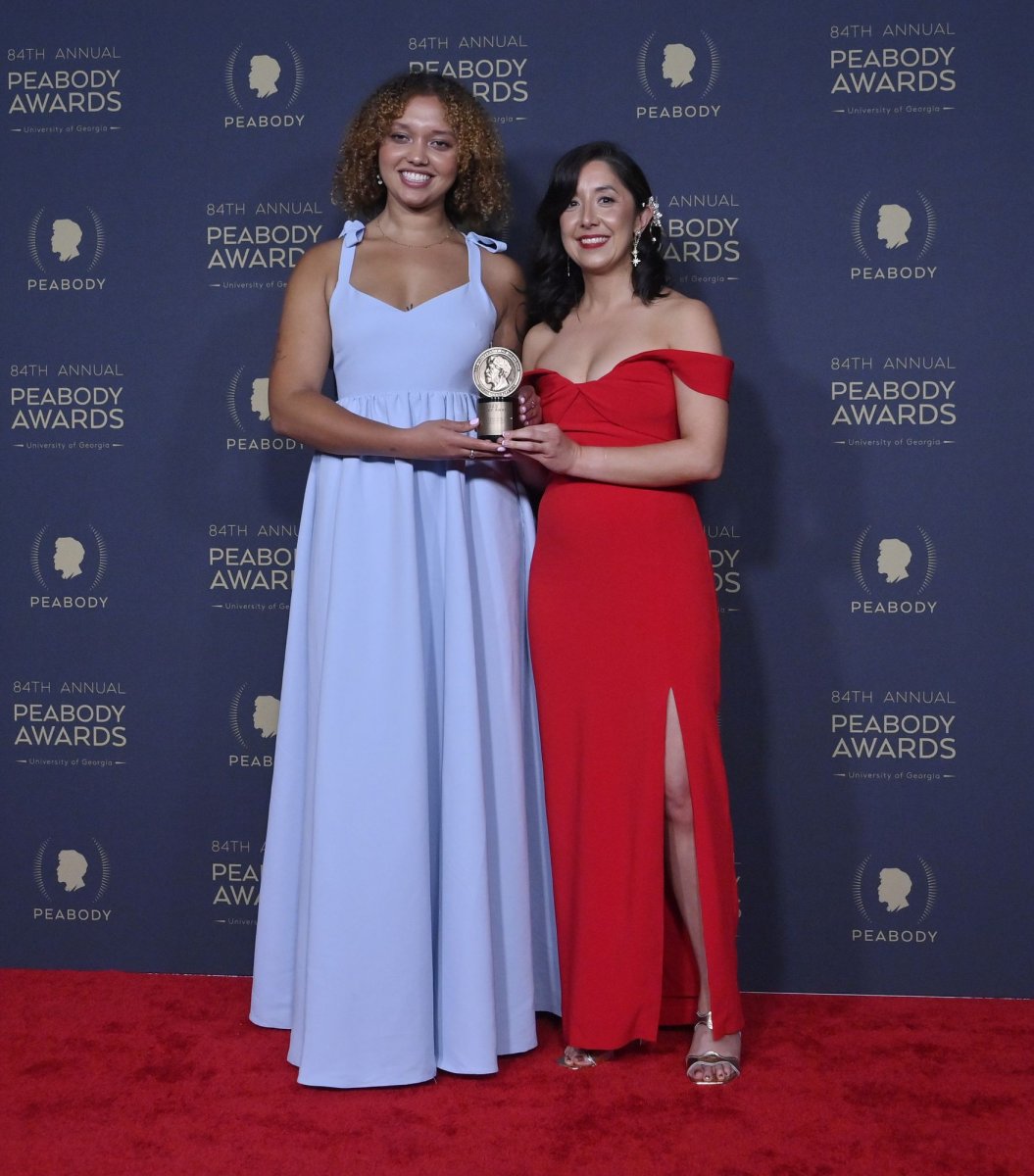 <p>Moriah Balingit, (L) and Sabby Robinson pose with their Radio/Podcast award for "Post Reports: Surviving to graduation." Photo by Jim Ruymen/UPI</p>