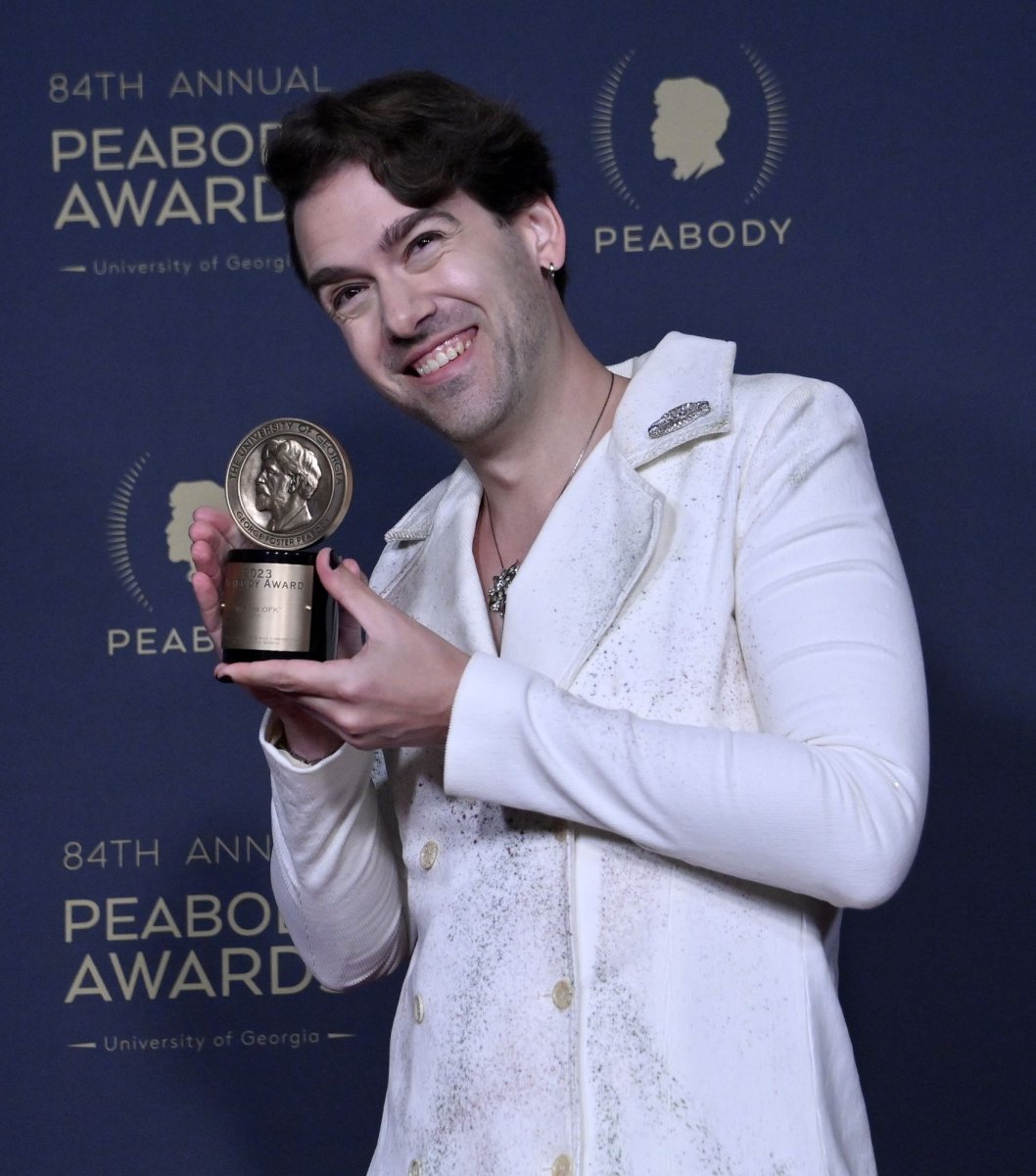 <p>Teddy Dief poses with his Interactive & Immersive award for "We Are OFK." Photo by Jim Ruymen/UPI</p>