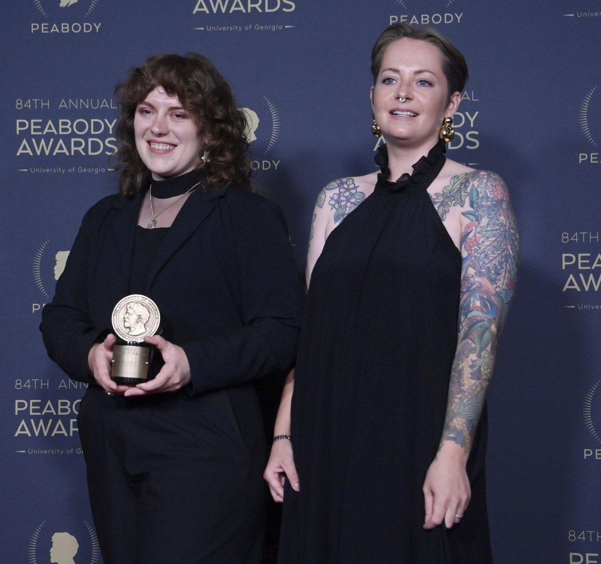 <p>Hannah Kennedy (L) and Kate Dollarhyde pose with their Interactive & Immersive award for "Pentiment." Photo by Jim Ruymen/UPI</p>
