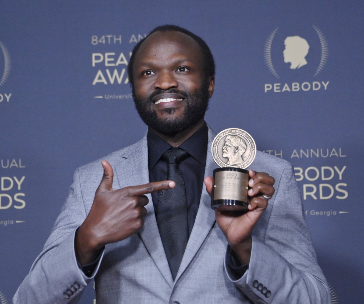 <p>Moses Bwayo poses with his Documentary award for "Bobi Wine: The People's President." Photo by Jim Ruymen/UPI</p>