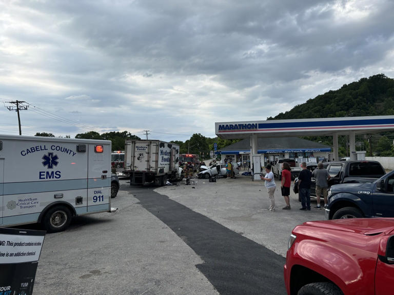 3 critically injured after car crashes into milk truck in gas station ...